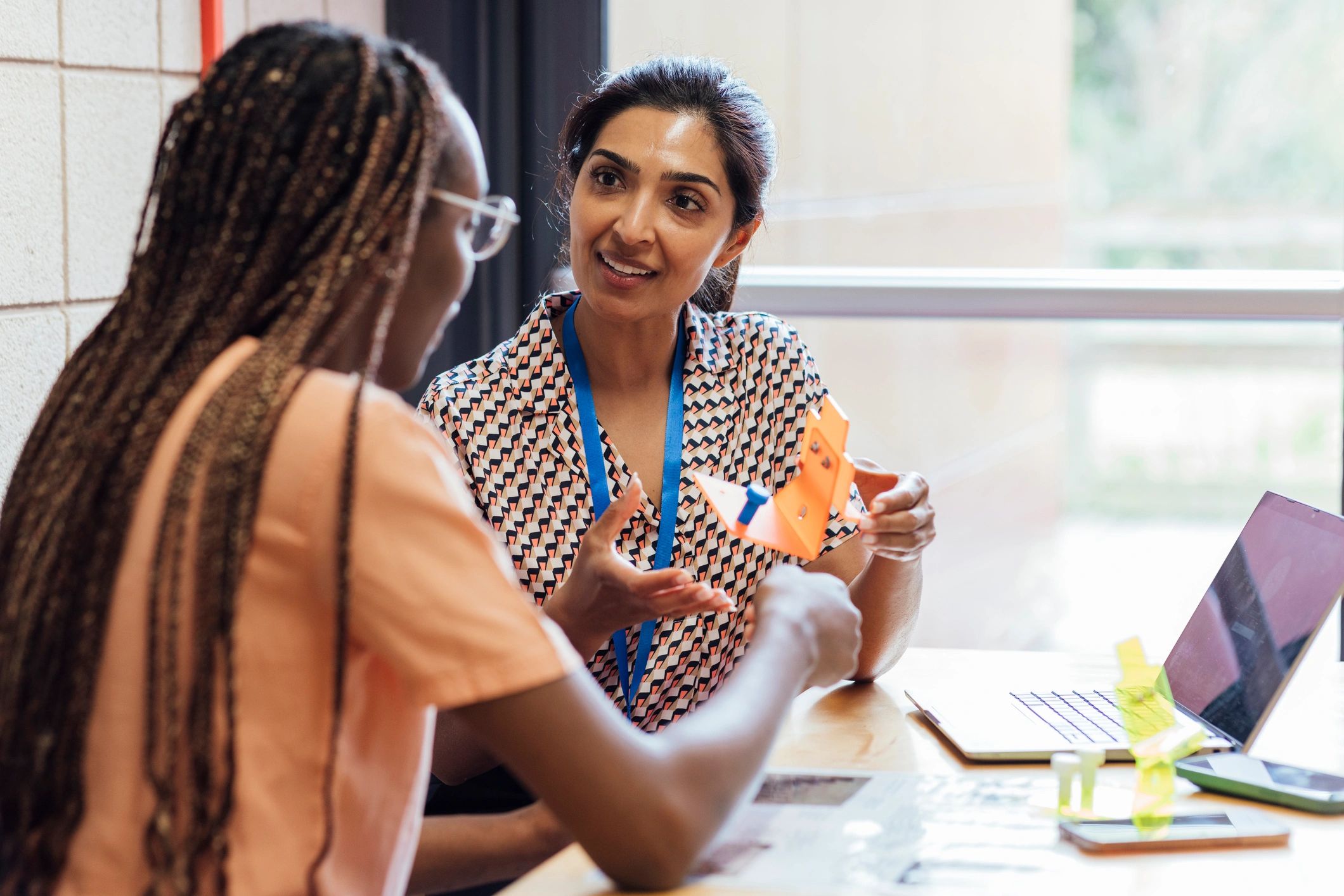 Advisor speaking with a student