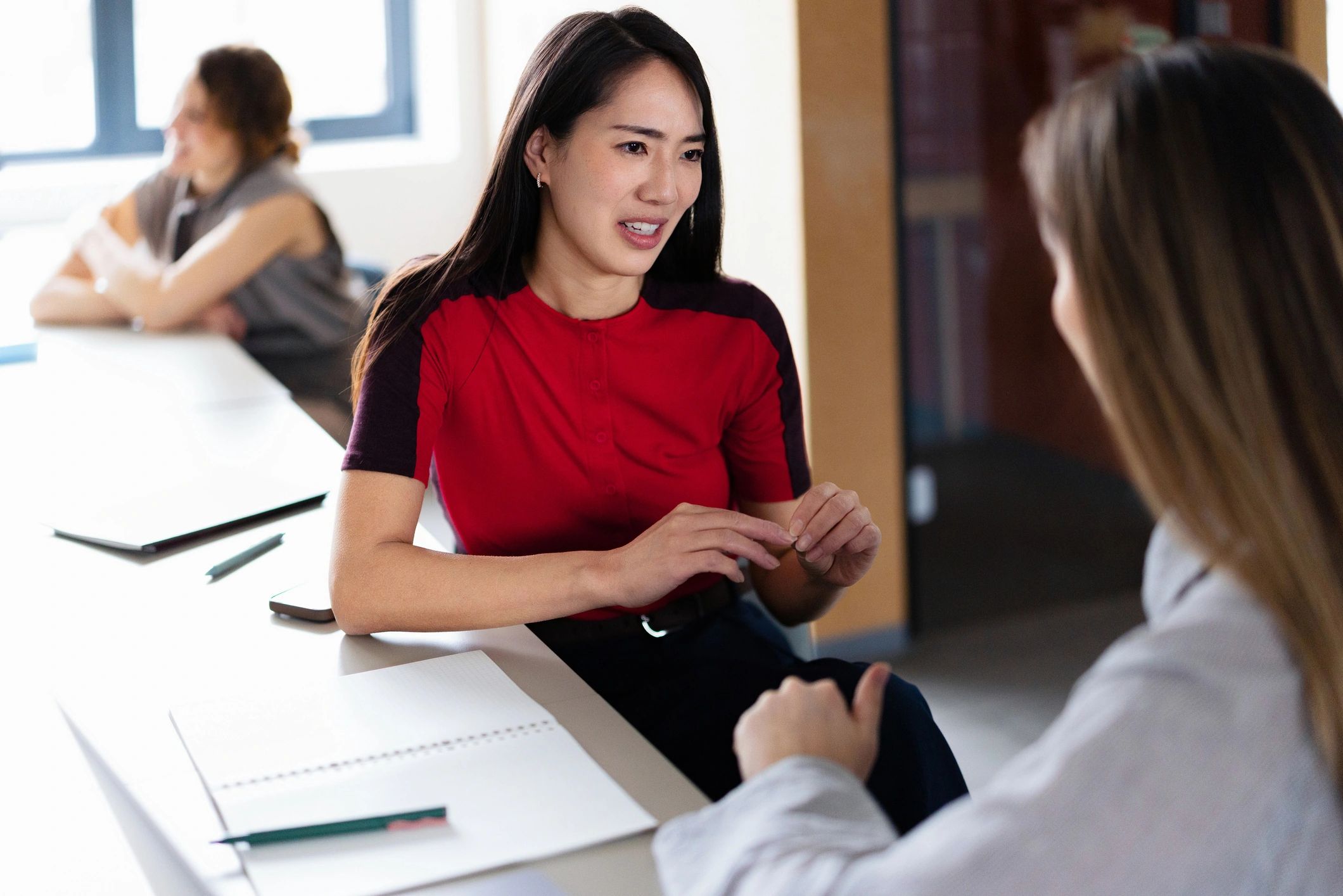 Consultant speaking with a student about university admissions